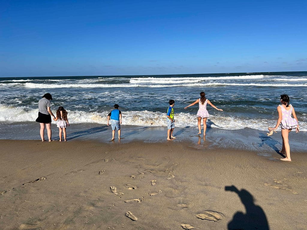 kids playing at Kitty Hawk beach