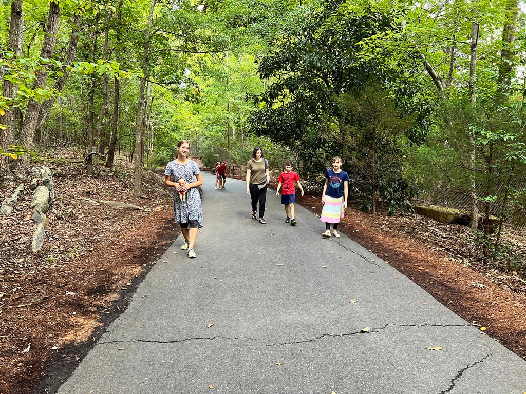 kids walking on trail at NC zoo