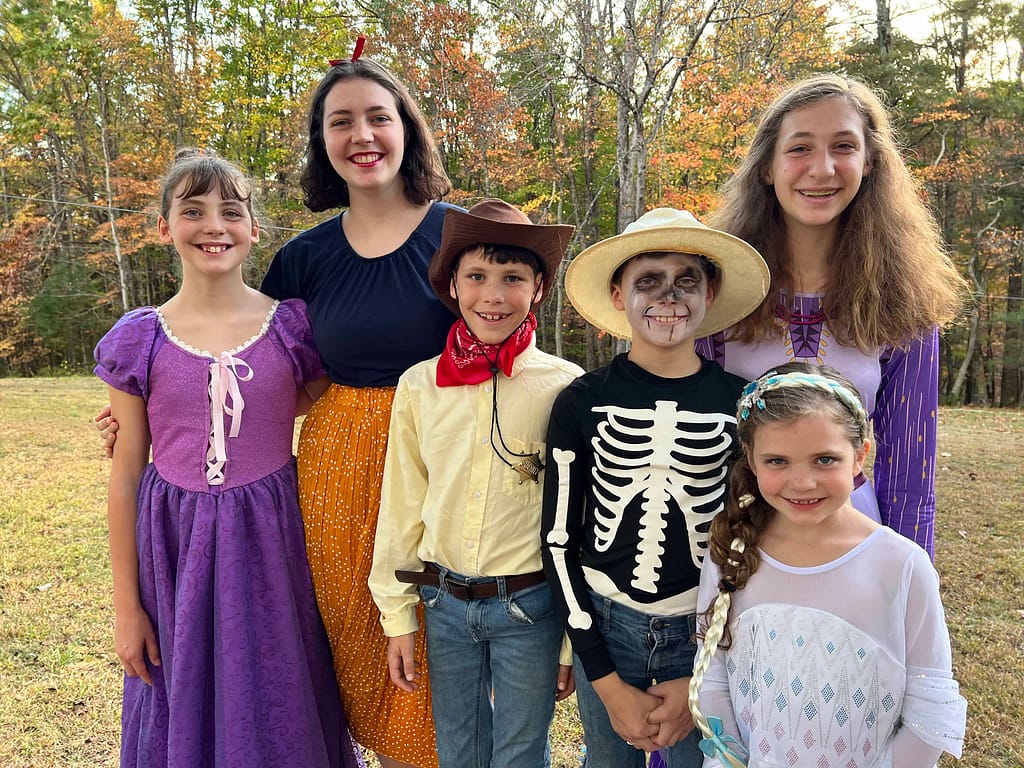 6 kids dressed up as Disney characters for halloween