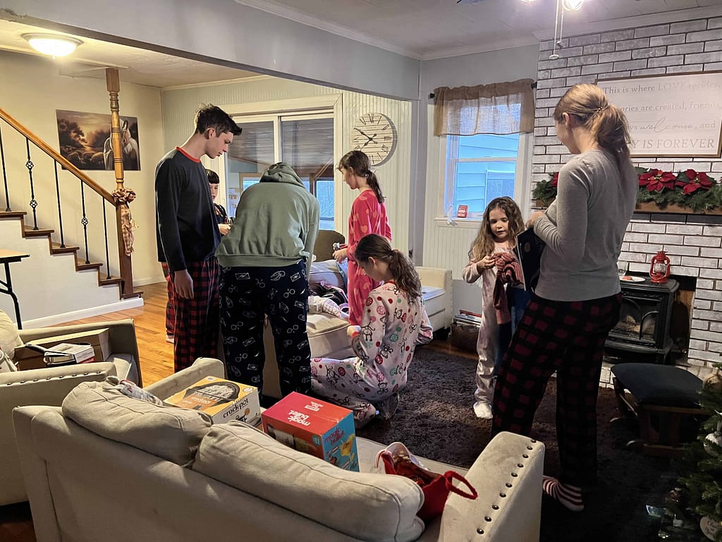 kids looking at their Christmas presents