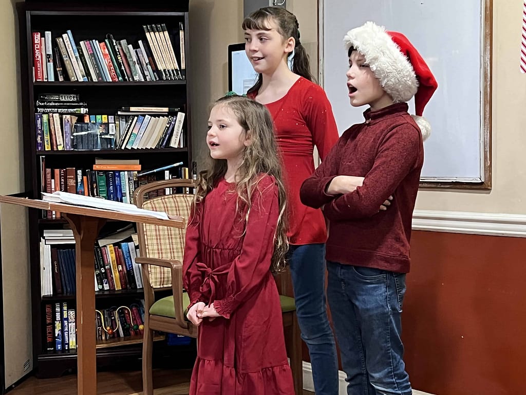 kids singing at Christmastime