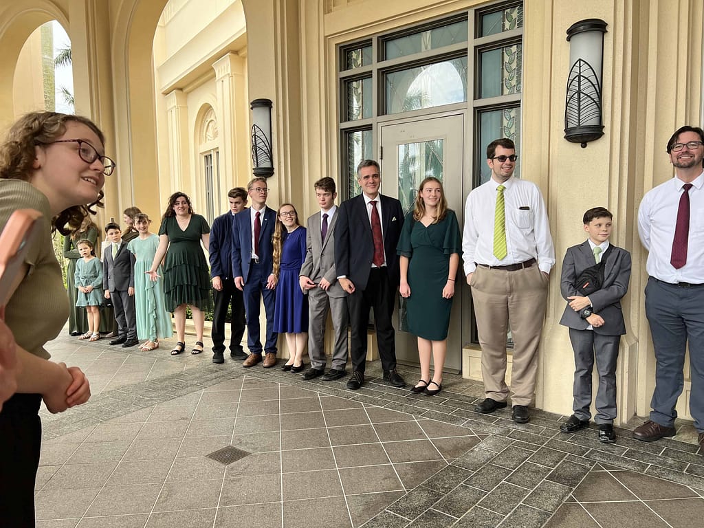 people lined up outside the Fort Lauderdale temple