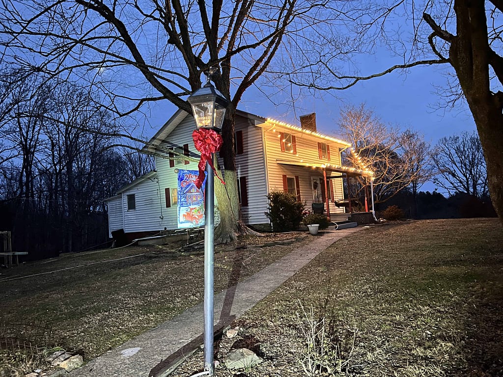 christmas lights on a 1930's farmhouse
