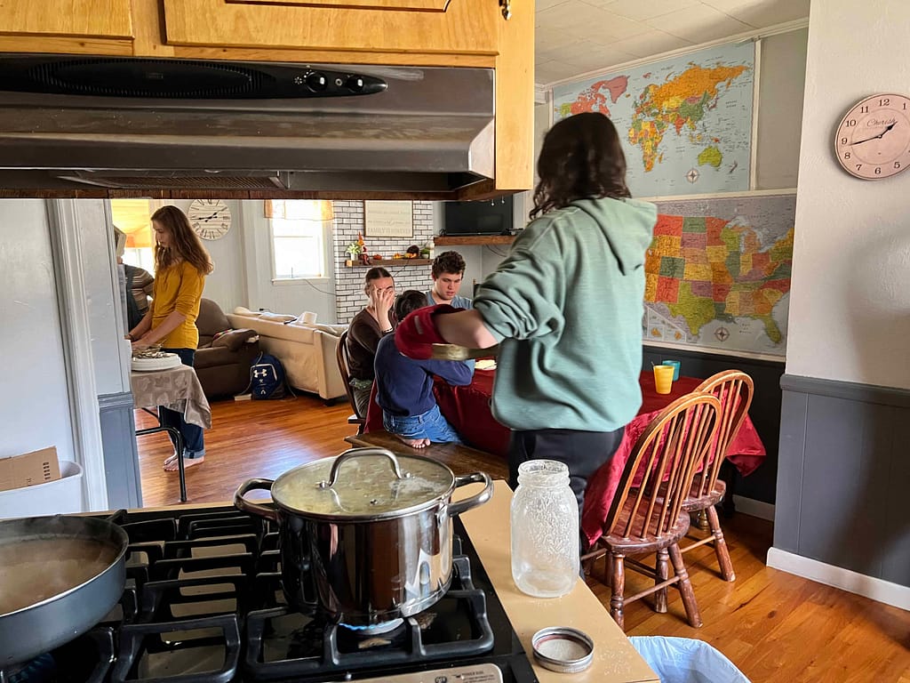 family getting Thanksgiving dinner ready