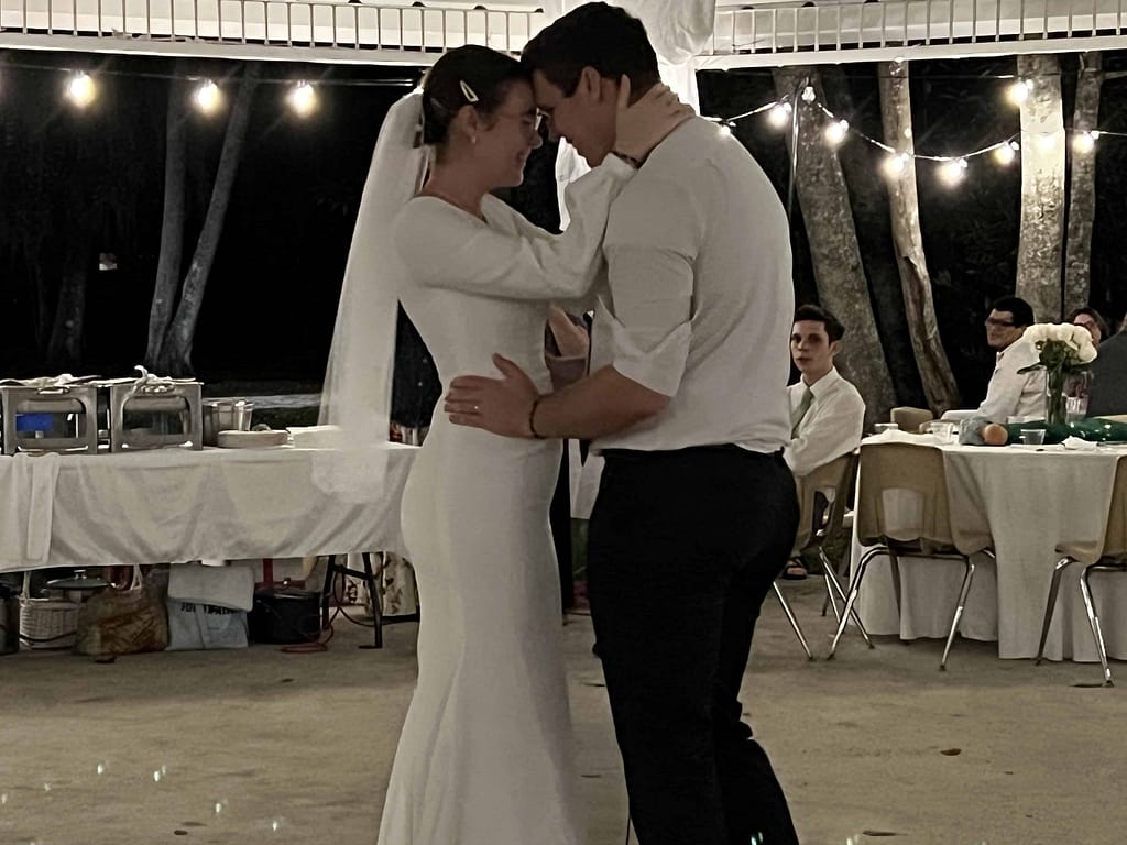 bride and groom dancing