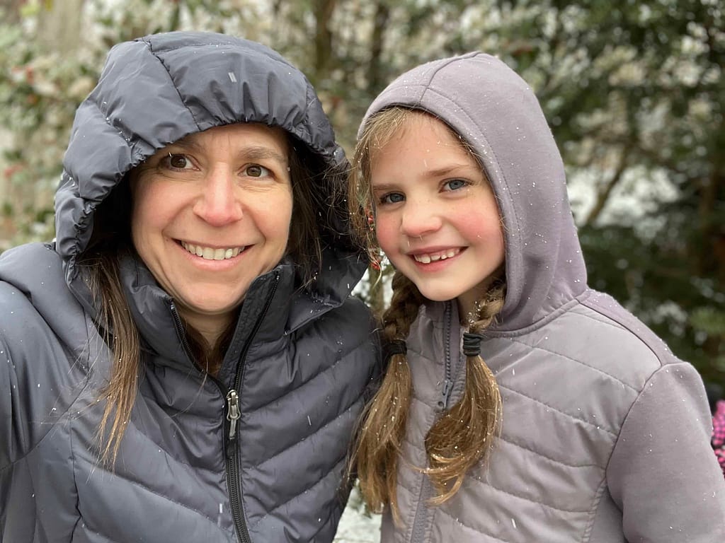 mom and daughter selfie in the snow