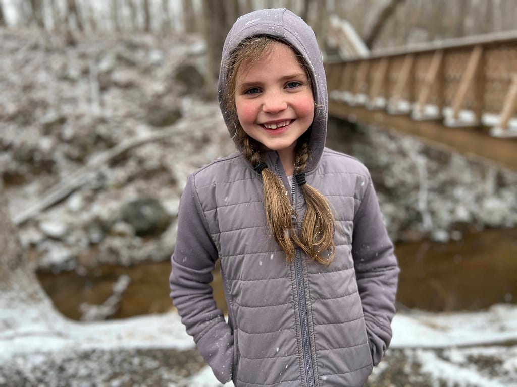 7 year old girl on a snowy hike