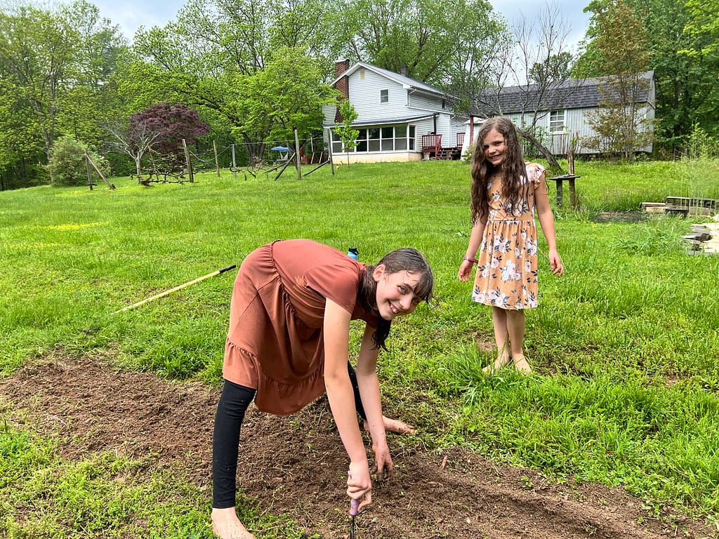 2 girls planting