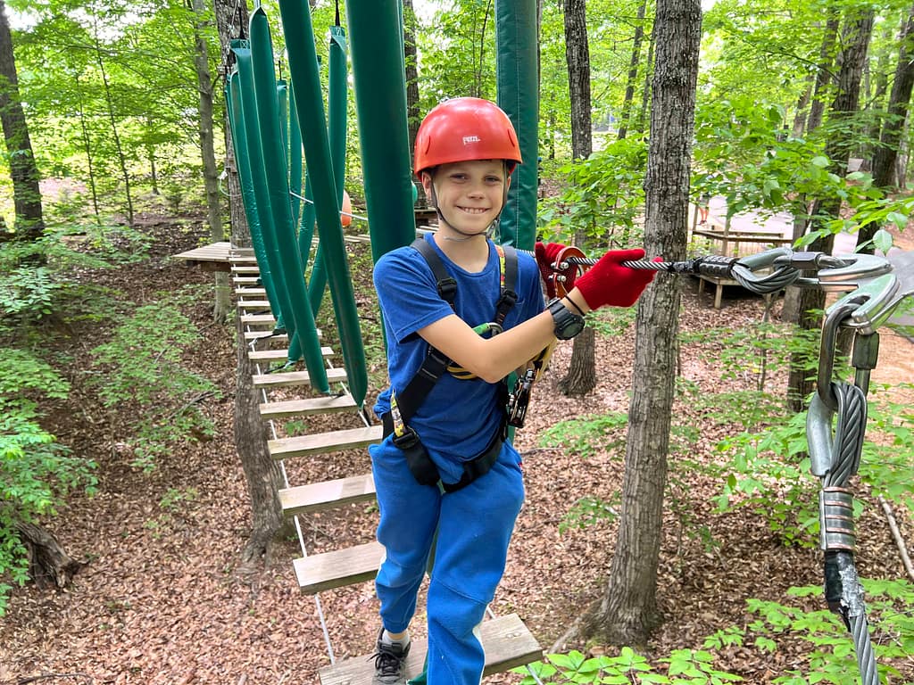 boy at a Zipline park