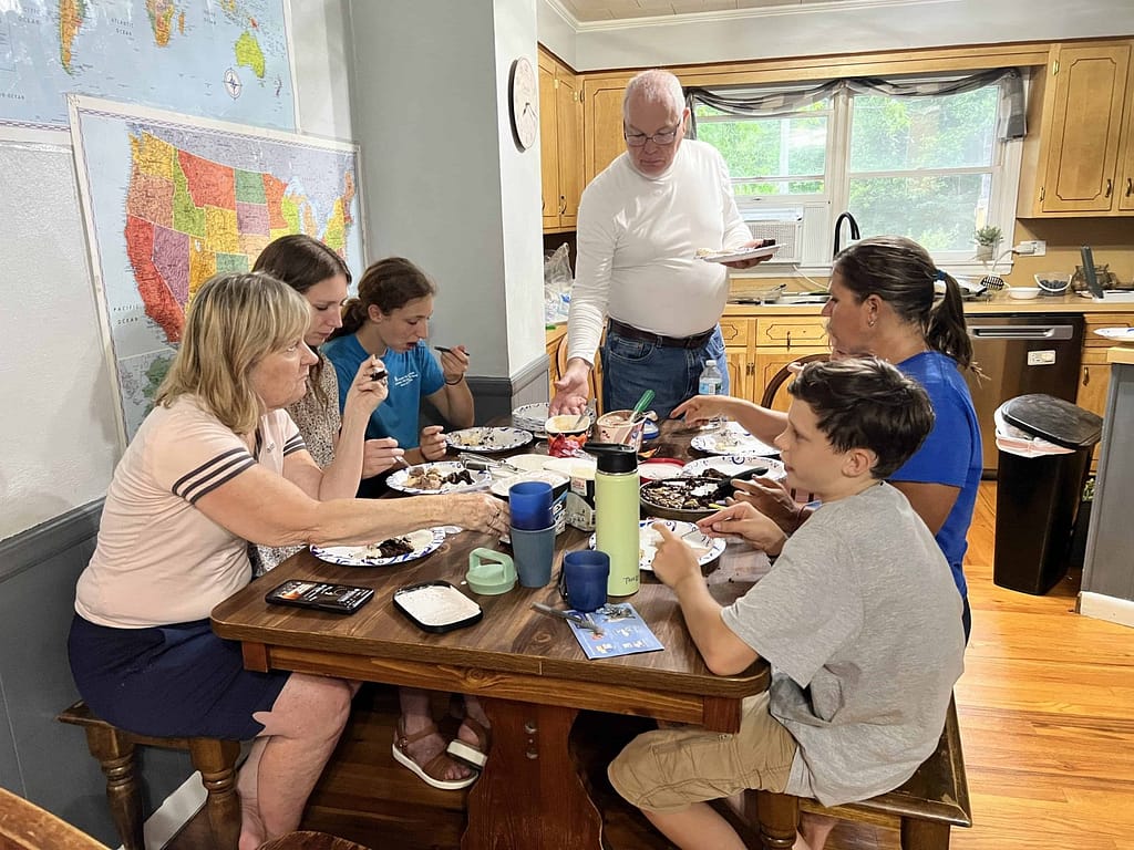 family eating dinner around the table