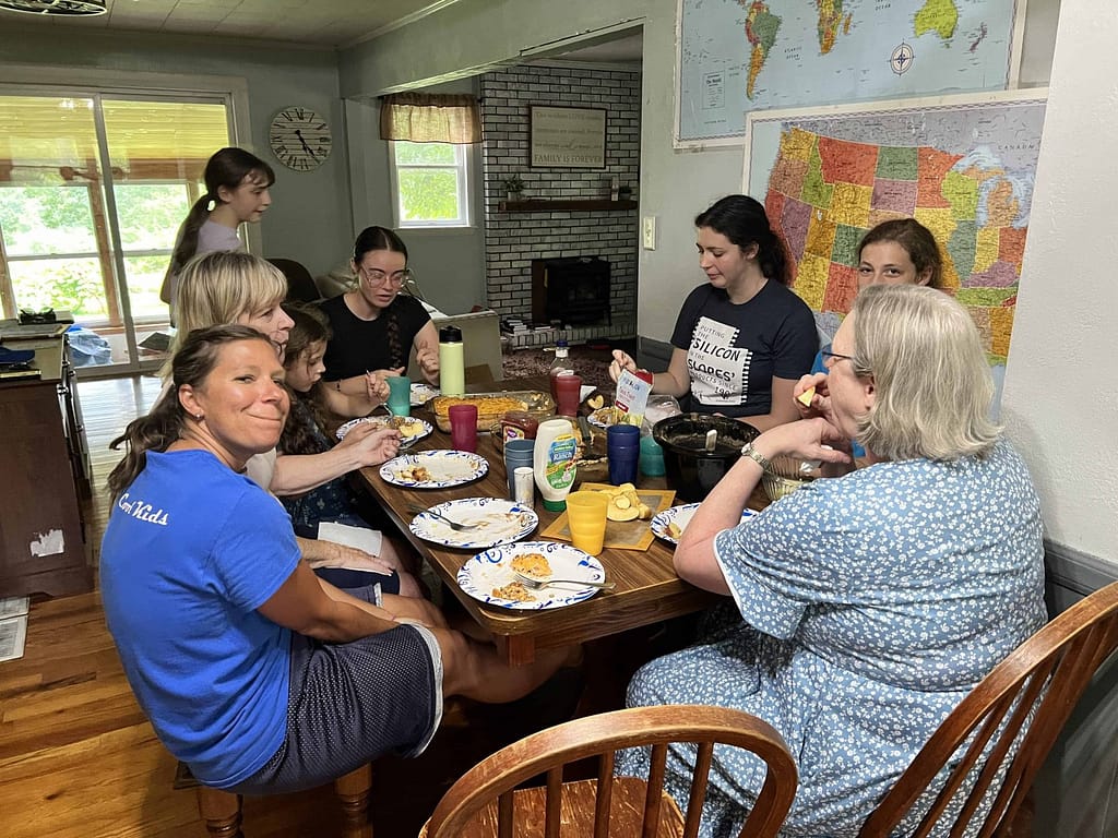 family eating dinner around the table