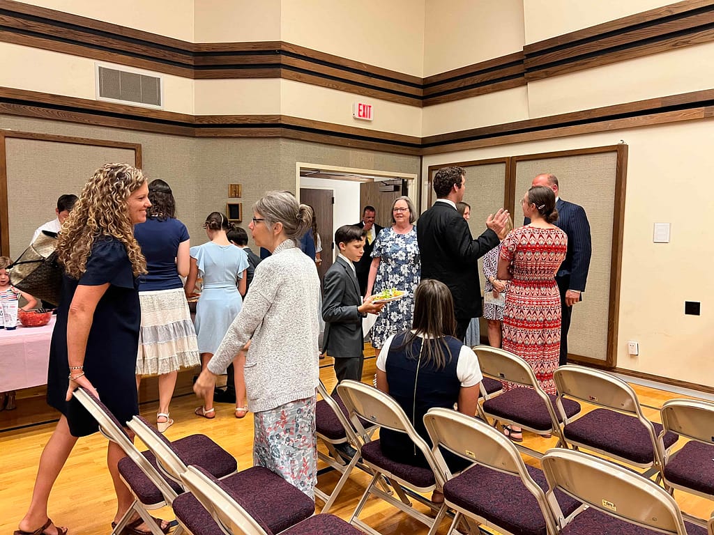 people talking after baptism