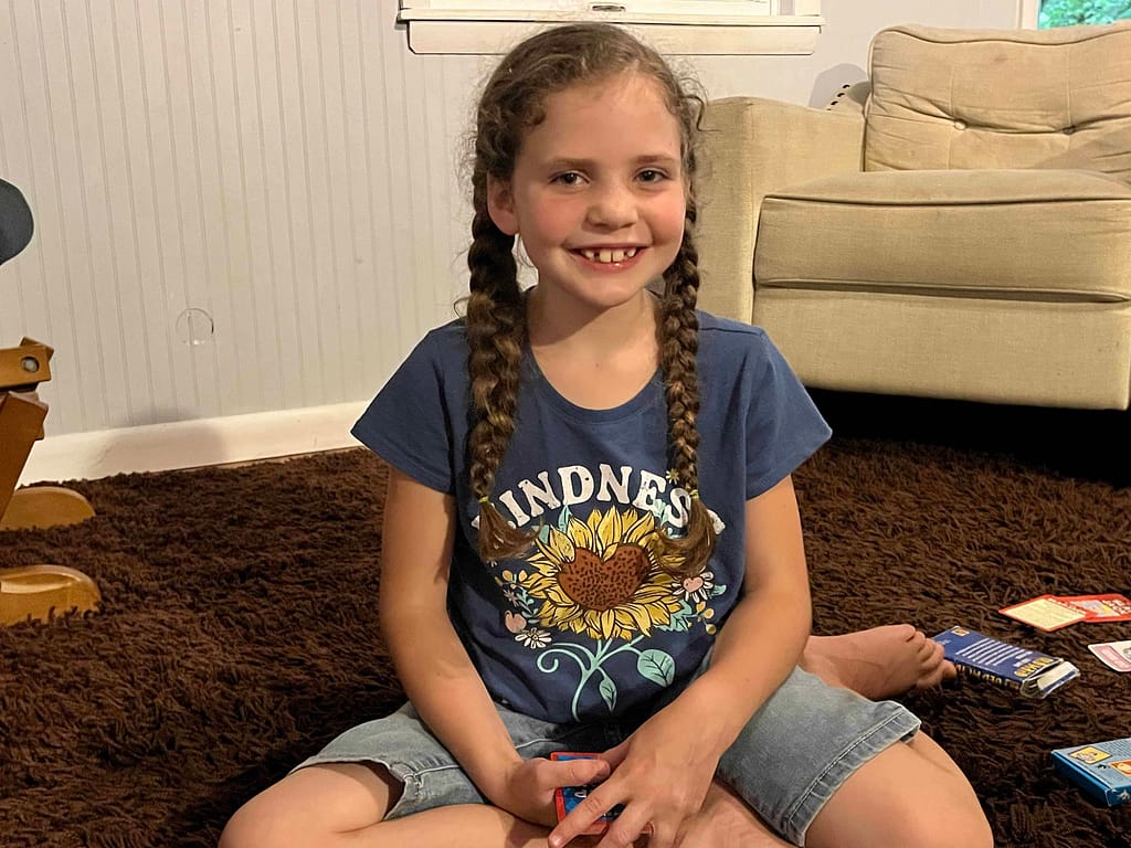 7 year old girl with braids in the living room