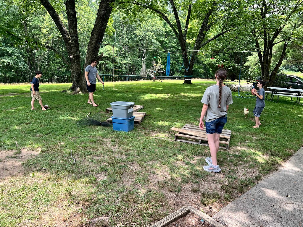 kids tossing a football