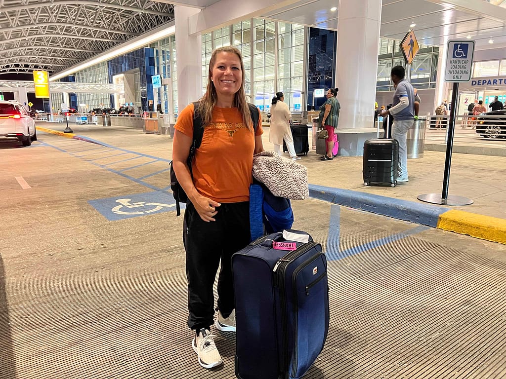 lady at the airport with luggage