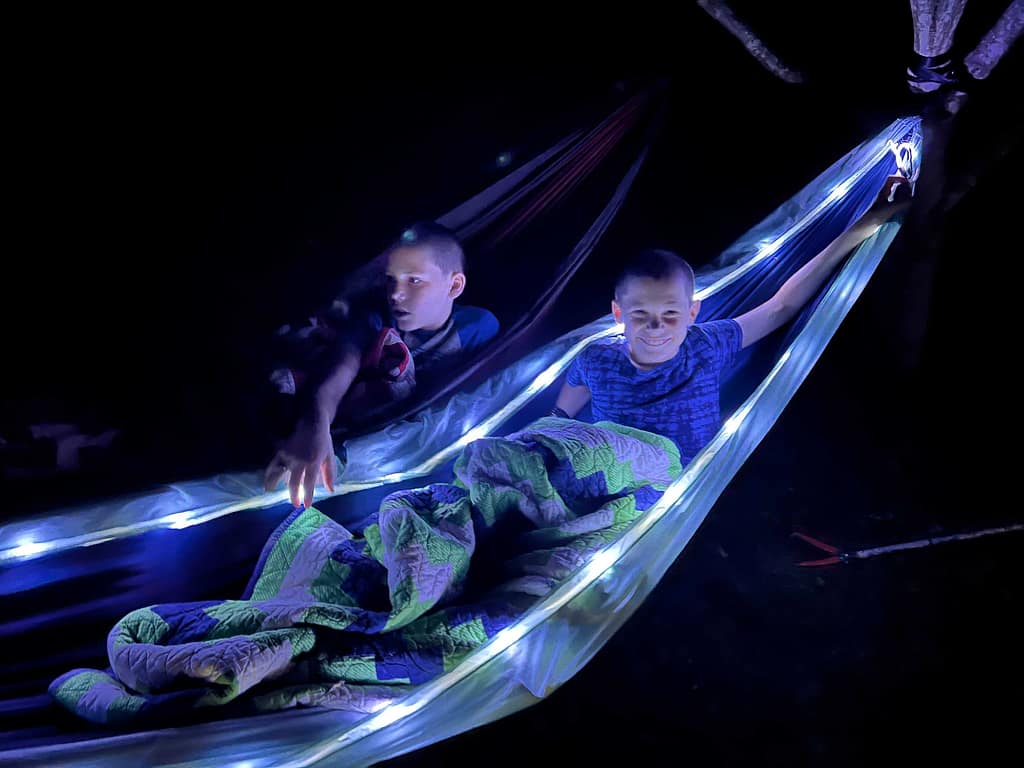 brothers sleeping in hammocks