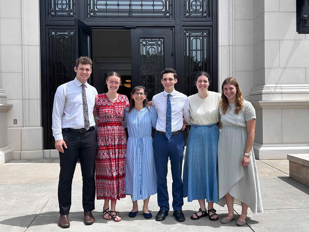 mother and 5 young adult children at the Raleigh Temple