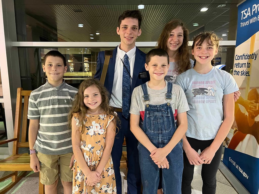 new missionary with 5 siblings at the airport
