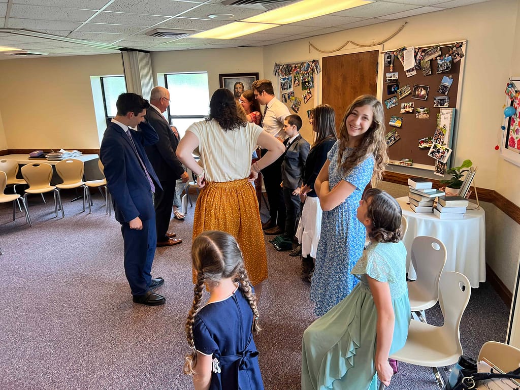 family in a room at church