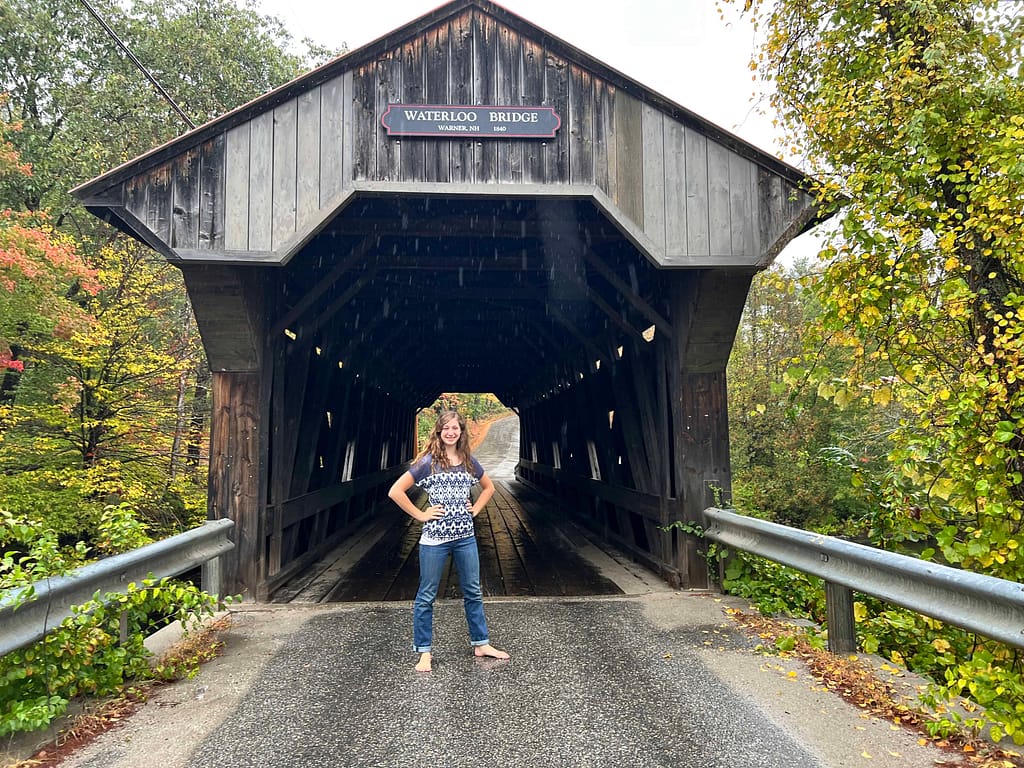 teen girl in covered bridge