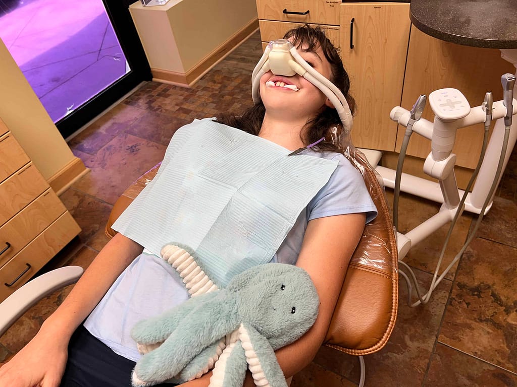 teen girl getting teeth pulled