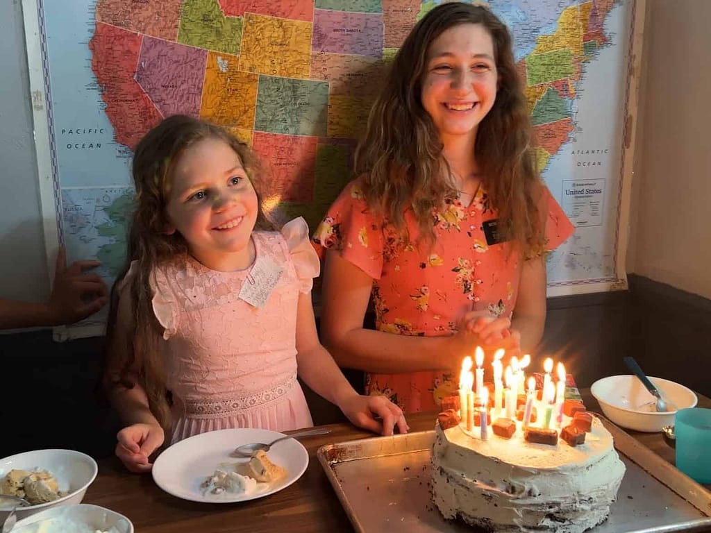 Girl turning 16 with sister next to her