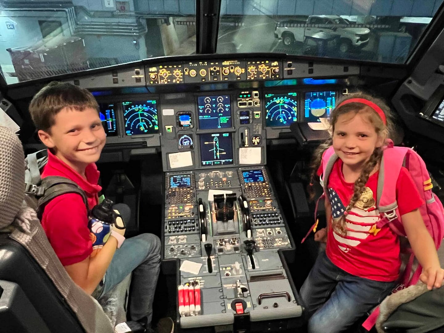 2 siblings in the cockpit