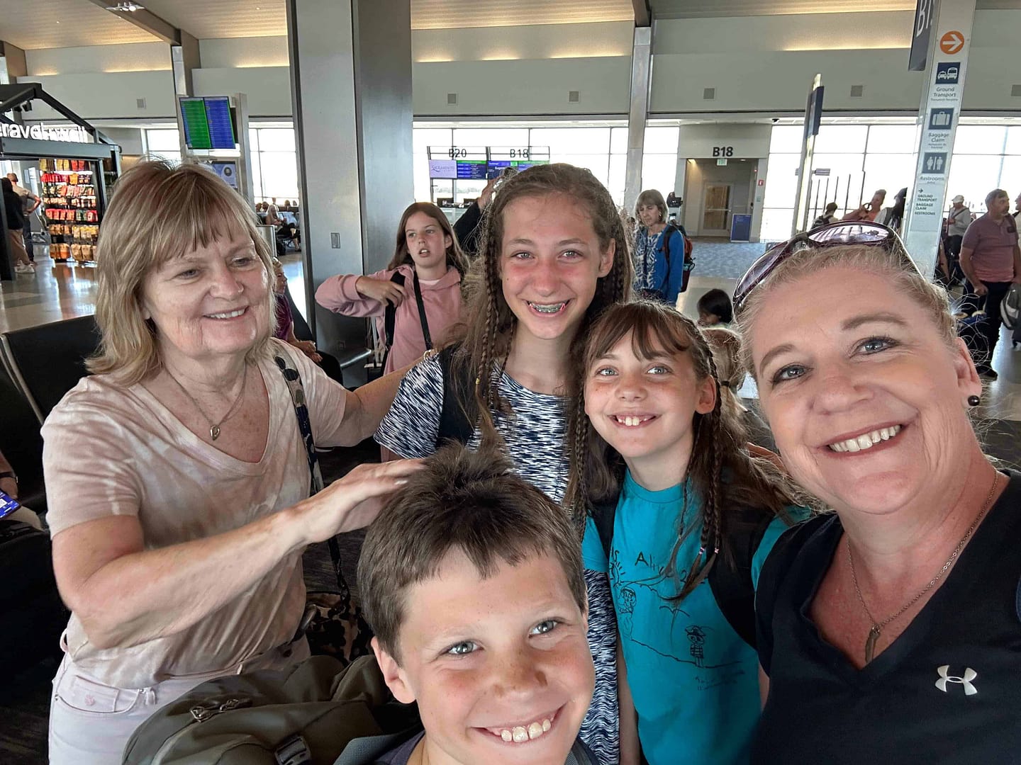 family selfie saying goodbye