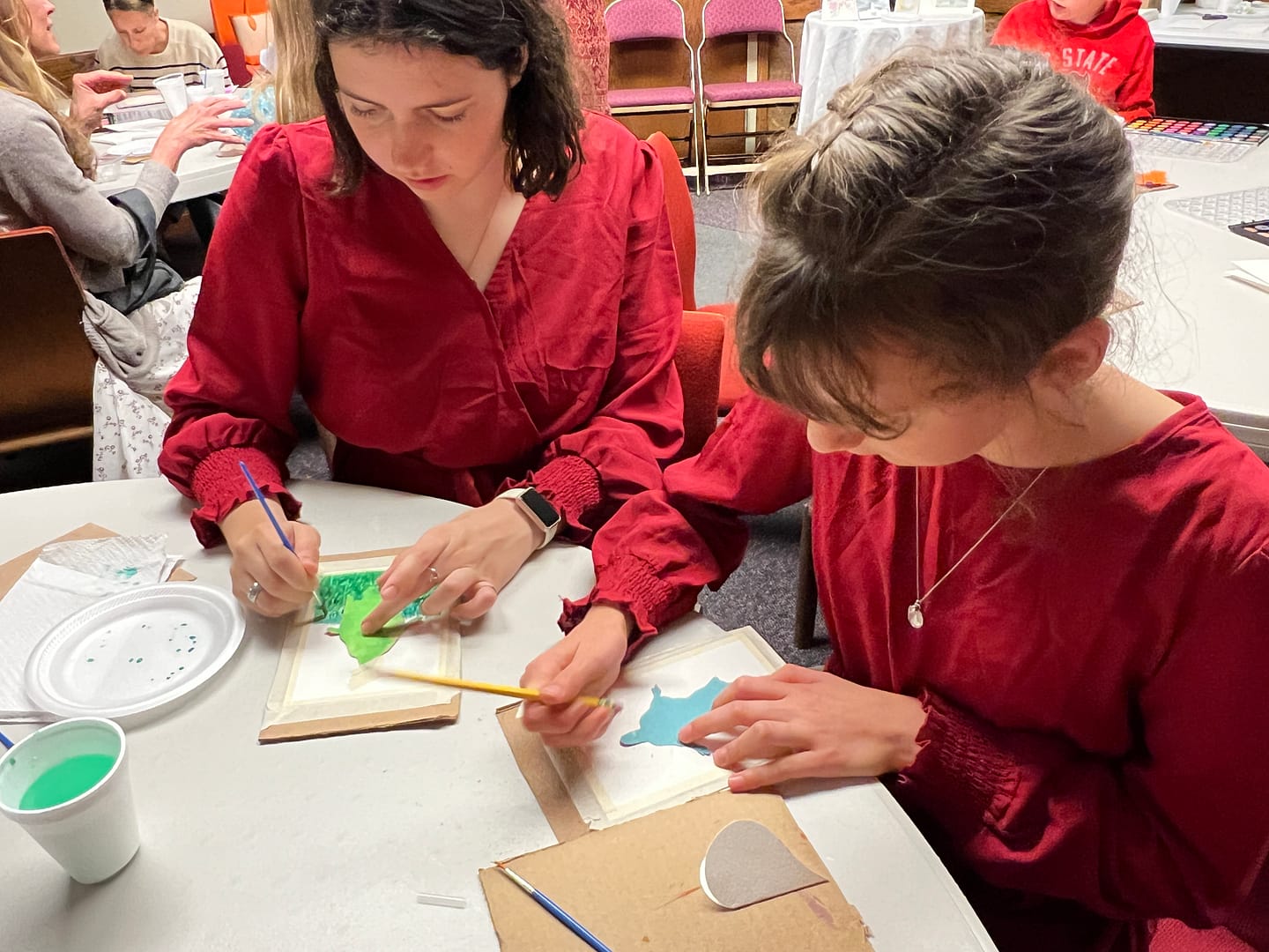 two sisters doing an art project
