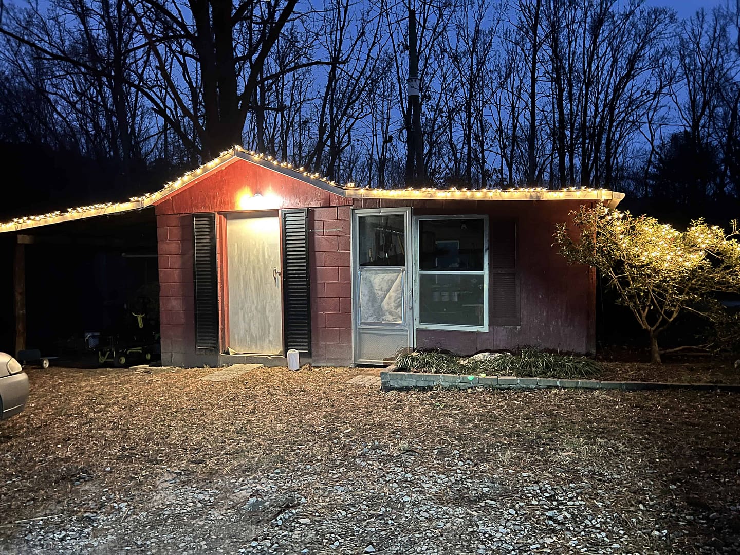 Christmas lights on an old shed