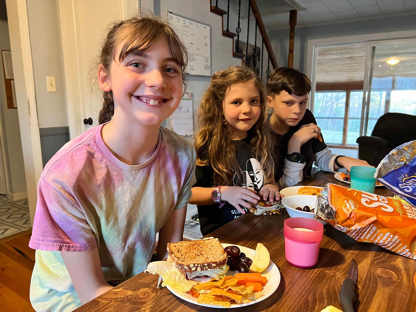 kids eating grilled cheese sandwiches