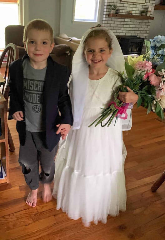 six year olds dress up as bride and groom and pretend to get married