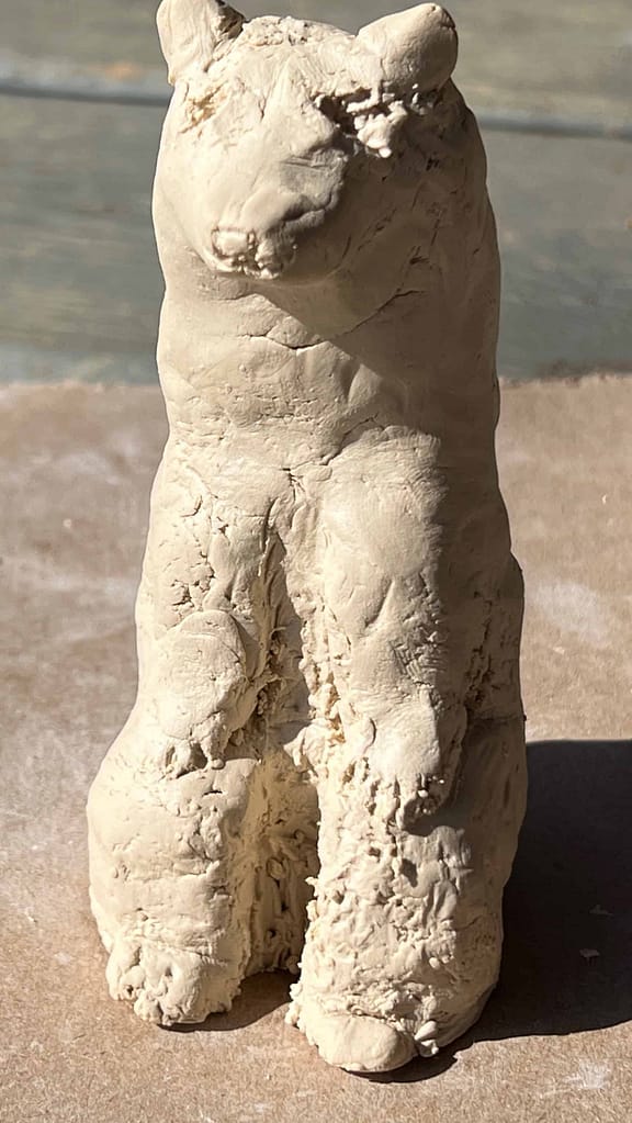 air dry clay sculpture of the front of a bear