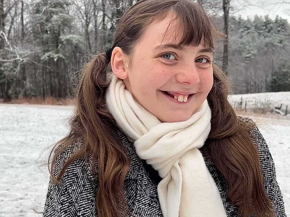 13 year-old girl with scarf in the snow