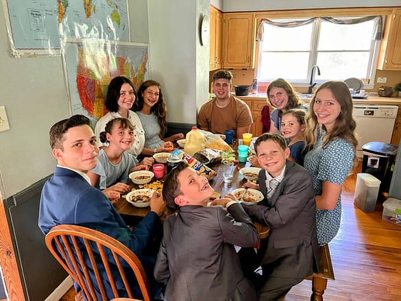 10 children eating Sunday dinner