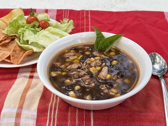 bowl of enchilada soup made in the crock pot