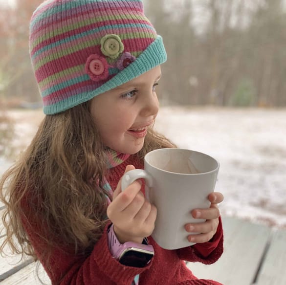 cute 6 year old drinking raw milk hot cocoa