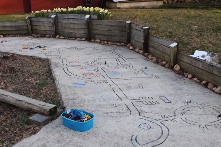 roads drawn on concrete for matchbox cars