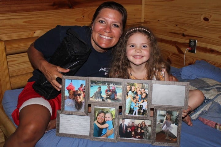 aunt giving niece a collage of the two of them together