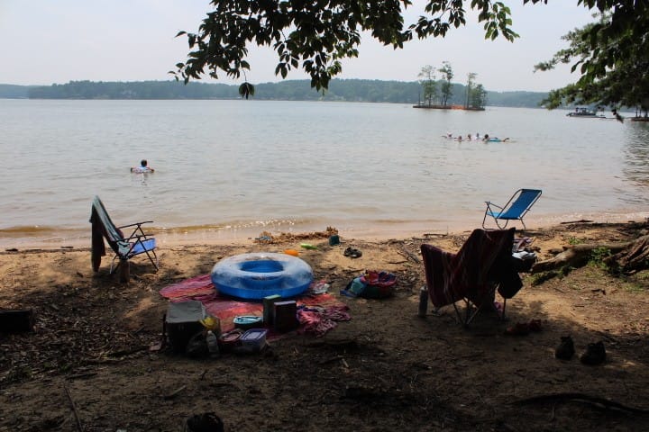 family hanging out in a cove on Lake Norman