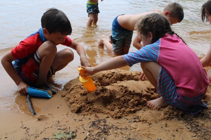 kids playing in the sand