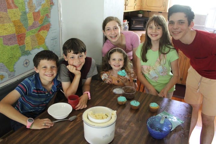 6 kids celebrating a sibling s birthday with cupcakes and raw milk ice cream