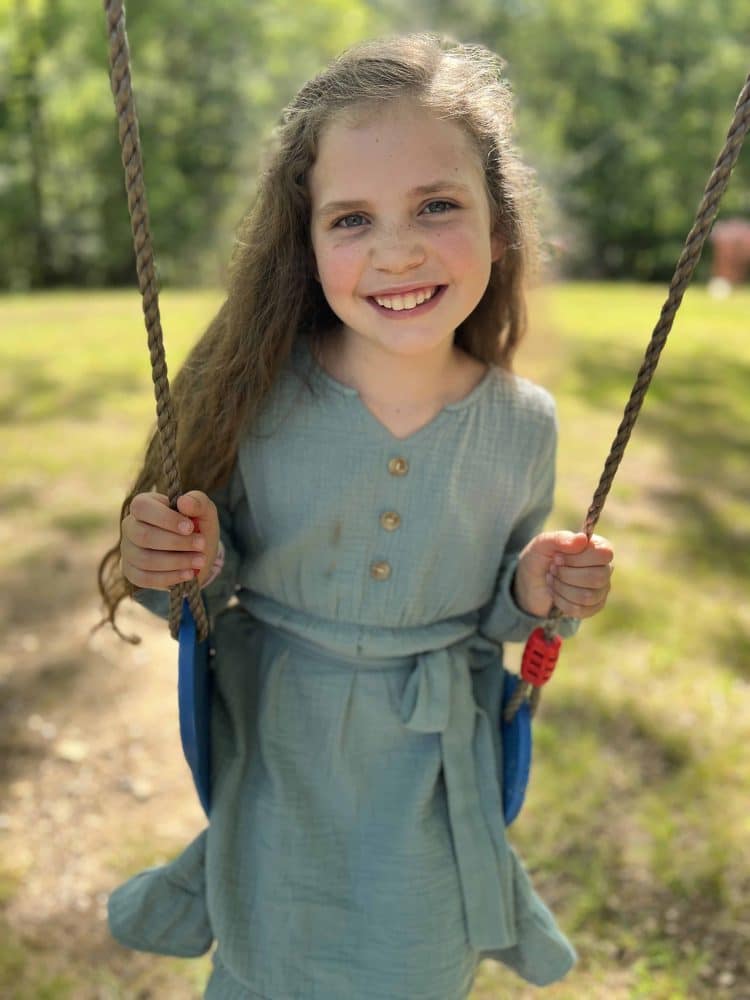 8 year old girl on swing