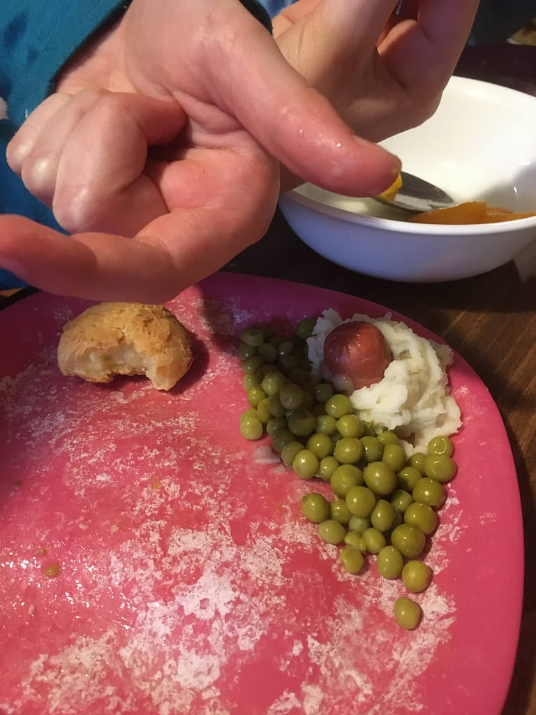 a hot dog groundhog dinner casting a shadow