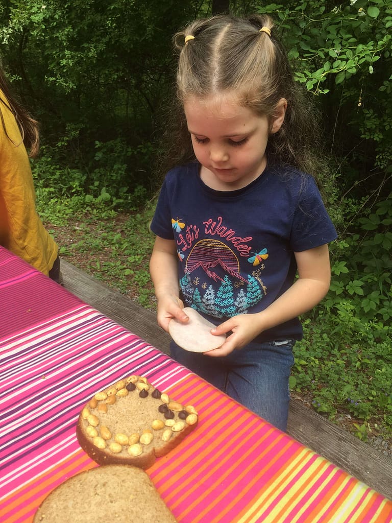 girl with peanut sandwich