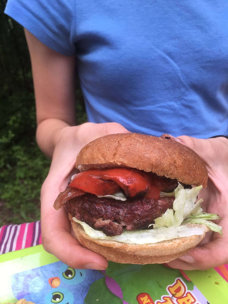 bacon, roasted red pepper hamburger made while camping
