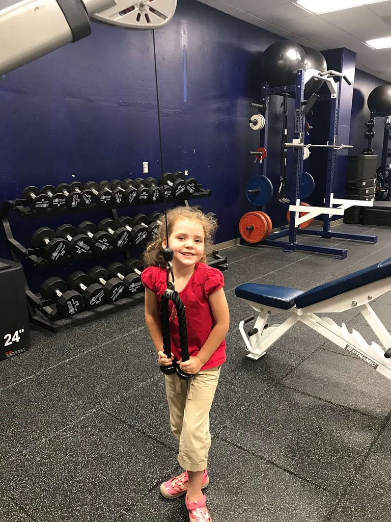 5 year old does weights at a gym