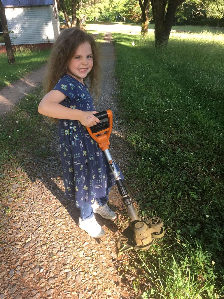 5 year old tries to use a weed eater