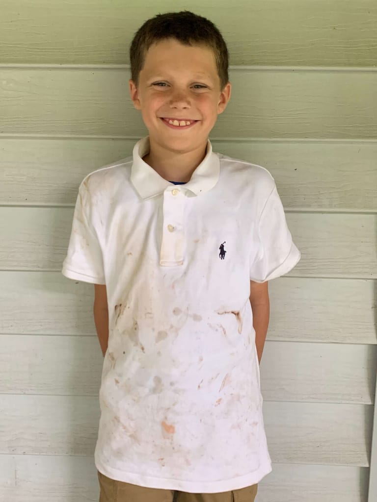 boy with a dirty white shirt