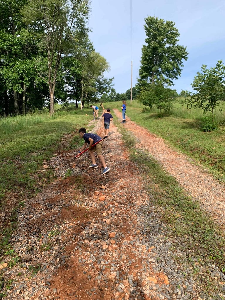 kids repairing the driveway